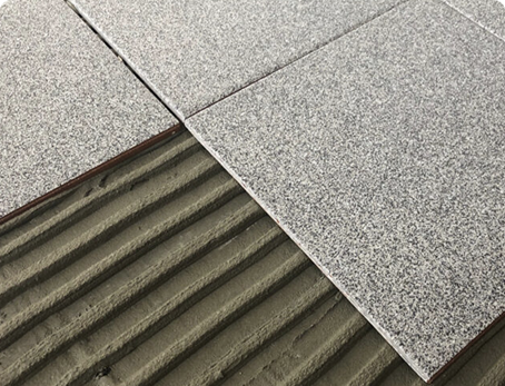 Low carbon mortars utilising waste materials to substitute for sand